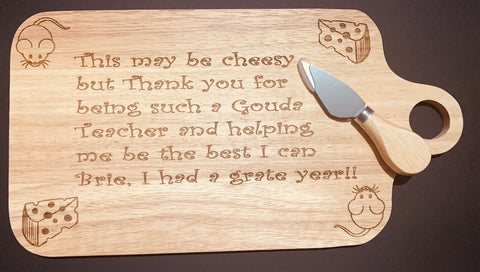Teachers cheesy cheese board with cheese knife.