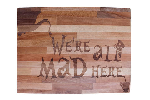 Alice in wonderland theme board “were all mad here”